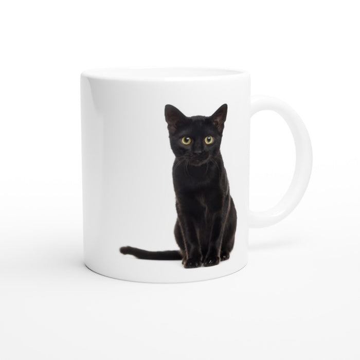 Tasse mit schwarzer kleiner Katze