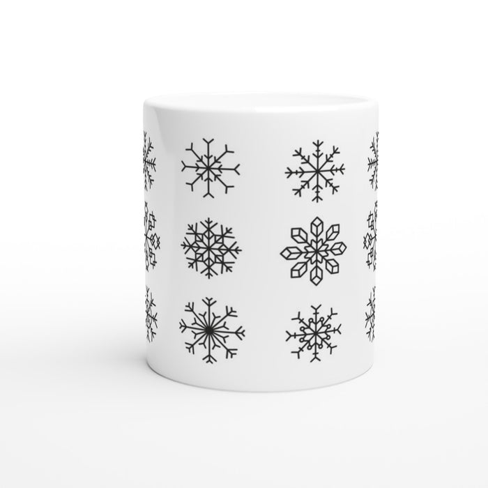 Tasse mit verschiedenen Schneeflocken - schwarz